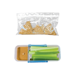 Protein-packed backpack-friendly snack idea: woven wheat crackers with celery and peanut, nut or seed butter. 